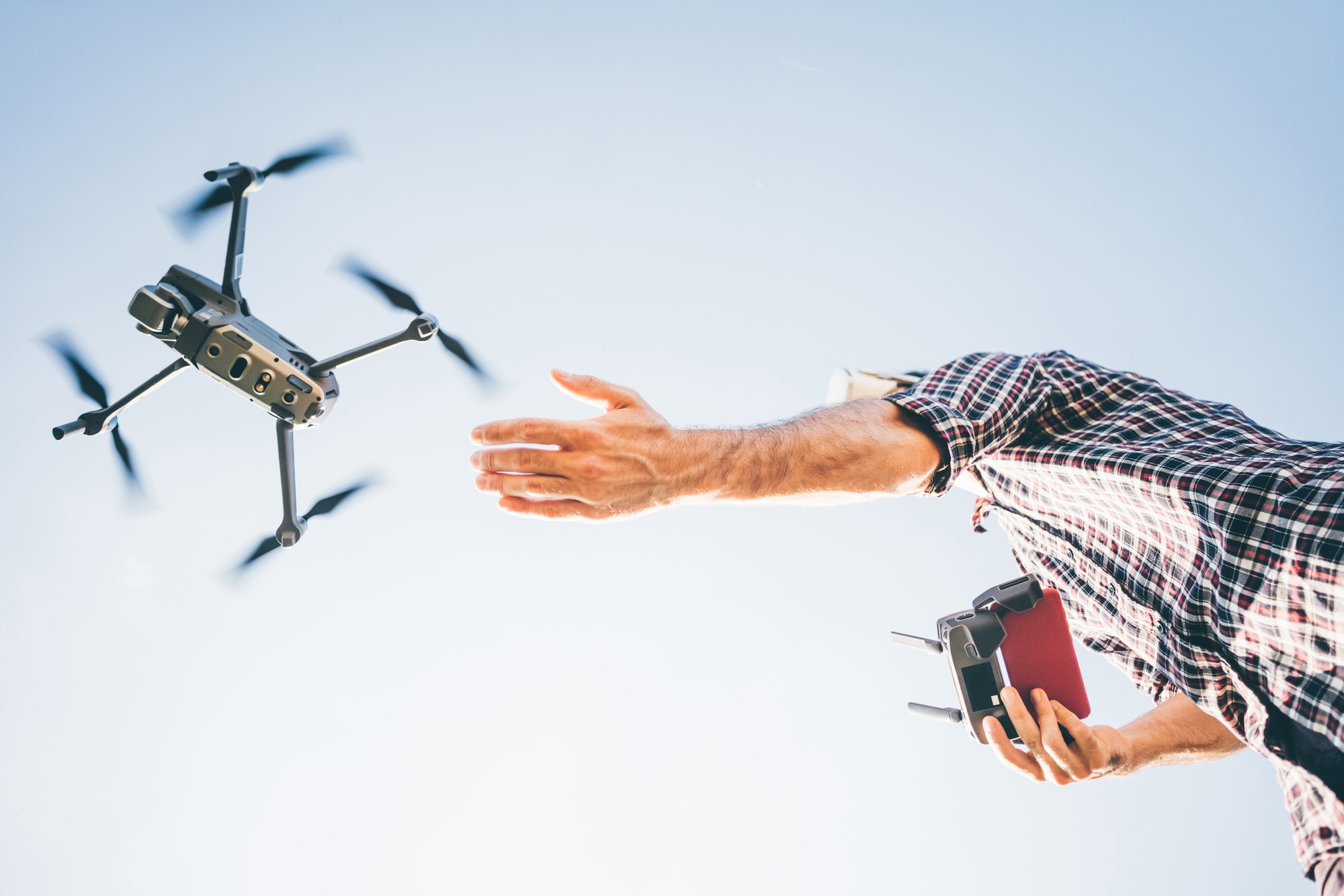 Man using drone.